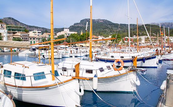 a group of boats docked