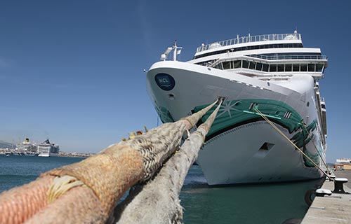 a boat docked at a pier