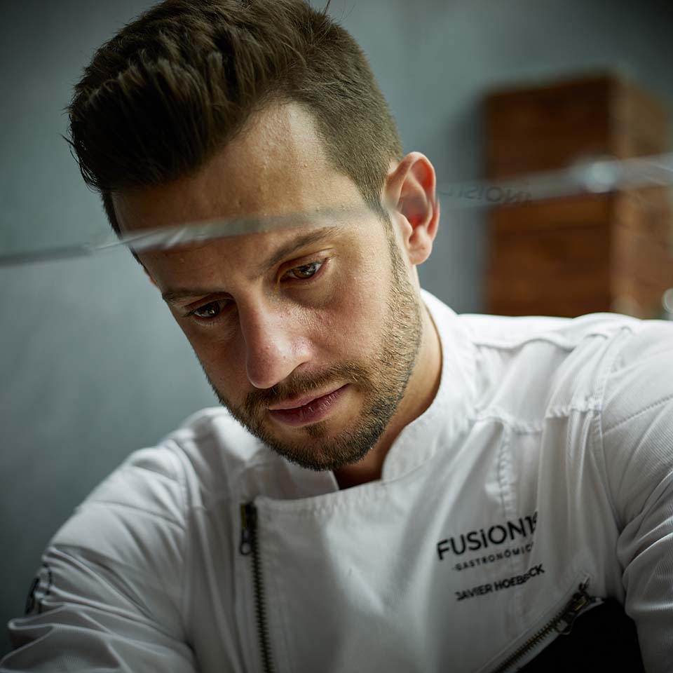 a man wearing a white shirt