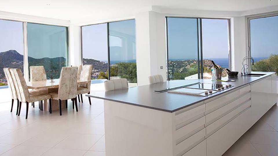 a kitchen with a large window