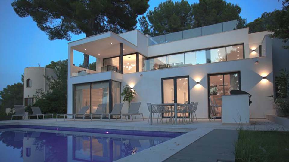 a house with a pool and a deck